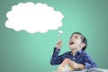 Little boy pointing an empty cloud bubble Royalty Free Stock Photo