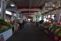 Picture of a local market in north America with a large choice of organic fruits and veggies.