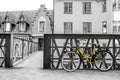 Lonely yellow bike standing in the typical street in Stockholm