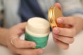 Picture of man medicine cream box holding in hand. Royalty Free Stock Photo