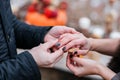 Picture of man putting engagement silver ring on woman hand, outdoor. autumn forest Royalty Free Stock Photo