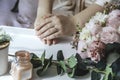 Picture of man and woman with bridal bouquet. Married couple holding hands, ceremony wedding day. Newly wed couple& x27;s Royalty Free Stock Photo