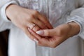 Picture of man and woman with wedding ring.Young married couple holding hands, ceremony wedding day. Newly wed Royalty Free Stock Photo