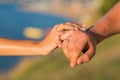 Picture of man and woman with wedding ring.Young married couple holding hands, ceremony wedding day. Newly wed couple`s hands wit Royalty Free Stock Photo