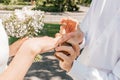 Picture of man and woman with wedding ring.Young married couple holding hands, ceremony wedding day. Newly wed Royalty Free Stock Photo