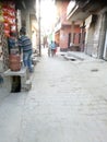 This picture is of a market in Ghaziabad city where a shop is open from which people buy goods.