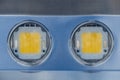 Picture of metal panel with two huge light emitting diodes Royalty Free Stock Photo