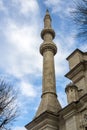 Detail of a stone minaret of the new mosque of Eminonu in Istanbul, Turkey, a symbol of islamic religion Royalty Free Stock Photo