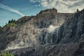 Picture of mining in a quarry with demolition equipment, industrial photography, mining and environmental destruction