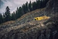 Picture of mining in a quarry with demolition equipment, industrial photography, mining and environmental destruction