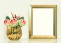 Picture mockup with golden frame and rose flowers. Vintage objec Royalty Free Stock Photo