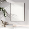 Picture mockup with white vertical frame on white wall with palm leaf shadow, 3d rendering Royalty Free Stock Photo