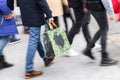 crowd of shopping people walking in a pedestrian area Royalty Free Stock Photo