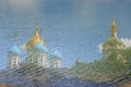 Moscow, Russia - June 25, 2019: Domes of the Orthodox Christian Church in the Novospassky Monastery and waves. Multiple exposure.