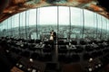 A picture of newlyweds standing in the front of a great cityscape in a panoramic restaurant Royalty Free Stock Photo