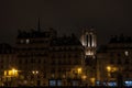 Notre Dame de Paris cathedral surrounded by medieval residential buildings typical from Ile de la Cite in Paris, France Royalty Free Stock Photo