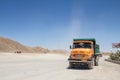 Old Iranian Dump Truck standing on a highway parking lot near Yazd, in the middle of the desert, on the road connecting most of th