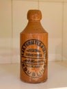 Old Rustic vintage ceramic bottle on shelf Royalty Free Stock Photo