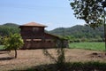 Picture of old warehouse surrounded by agricultural land In Indian village constructed with brown bricks Royalty Free Stock Photo