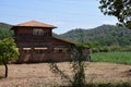 Picture of old warehouse surrounded by agricultural land In Indian village constructed with brown bricks Royalty Free Stock Photo