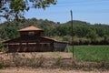 Picture of old warehouse surrounded by agricultural land In Indian village constructed with brown bricks Royalty Free Stock Photo