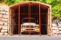 Old yellow truck behind a fence Royalty Free Stock Photo