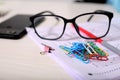 Picture of OMR sheet, paper pin, glasses, pen and phone Royalty Free Stock Photo