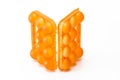 Picture of Open Empty Obsolete Orange Egg Hiolder. Placed Against White Background
