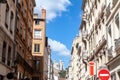 Panorama of Basilique Notre Dame de Fourviere Basilica church in Lyon, France, seen from a nearby narrow street, surrounded by Royalty Free Stock Photo