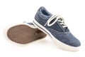 Picture of a pair of blue trainers over a white background. Royalty Free Stock Photo