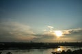 Sunny summer sunset over usce, the confluence between the sava and the danube dunav river and the panorama of New Belgrade Royalty Free Stock Photo
