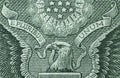 Picture of part of Great Seal of the United States with writing E Pluribus Unum, Out of many one, printed on One USA dollar Royalty Free Stock Photo