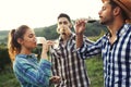 Picture of people tasting red wine in vineyard Royalty Free Stock Photo