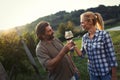 Picture of people tasting red wine in vineyard Royalty Free Stock Photo