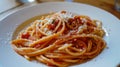 A Picture-Perfect Presentation: Elegant Spaghetti Pomodoro Delicately Arranged on a White Plate in 1