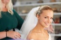 She is picture perfect. A young bride getting her hair done before the wedding. Royalty Free Stock Photo