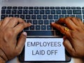 Picture of a person working on a laptop