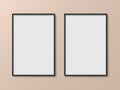 Picture photo frame realistic two empty mockup, poster frame close up on wall pastel beige color, isolated pictures frames mock-up Royalty Free Stock Photo