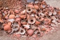 Picture of pile of broken Clay Pottery or Earthenware or traditional Jar on abandoned hut Royalty Free Stock Photo