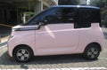 A picture of pink electric car