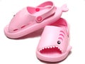 Picture of pink sendals that has shark shape