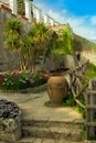 Picture postcard with terrace with flowers in the garden Villas Rufolo in Ravello. Amalfi Coast, Campania, Italy