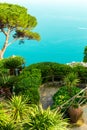 Picture postcard with terrace with flowers and trees,clay pots in the garden Villas Rufolo in Ravello. Amalfi Coast Royalty Free Stock Photo