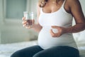 Picture of pregnant woman taking medication pills Royalty Free Stock Photo