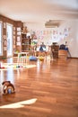 Picture of preschool playroom with colorful furniture and toys around empty kindergarten Royalty Free Stock Photo