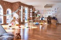 Picture of preschool playroom with colorful furniture and toys around empty kindergarten Royalty Free Stock Photo