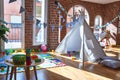 Picture of preschool playroom with colorful furniture and toys around empty kindergarten Royalty Free Stock Photo