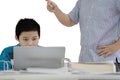 Preteen boy scolded by his father on studio Royalty Free Stock Photo