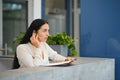 Picture of pretty receptionist at work. Royalty Free Stock Photo