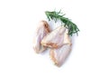 Raw chicken wings with rosemary isolated on white background Royalty Free Stock Photo